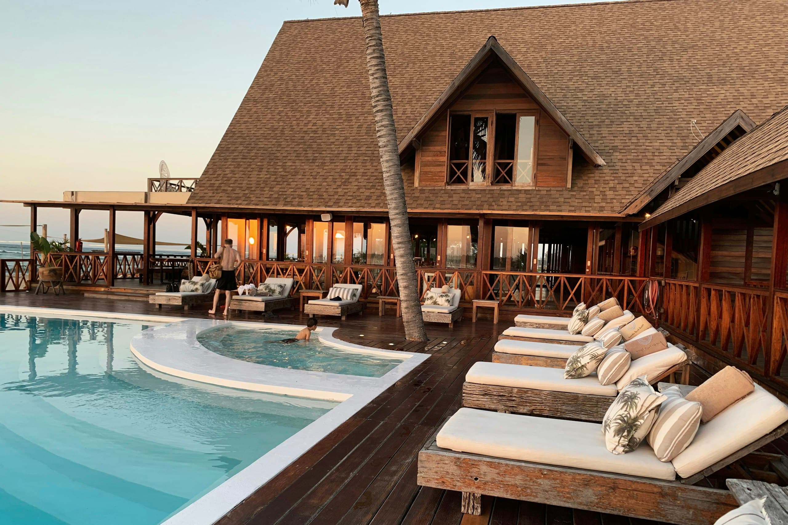 Luxury hotel exterior with pool